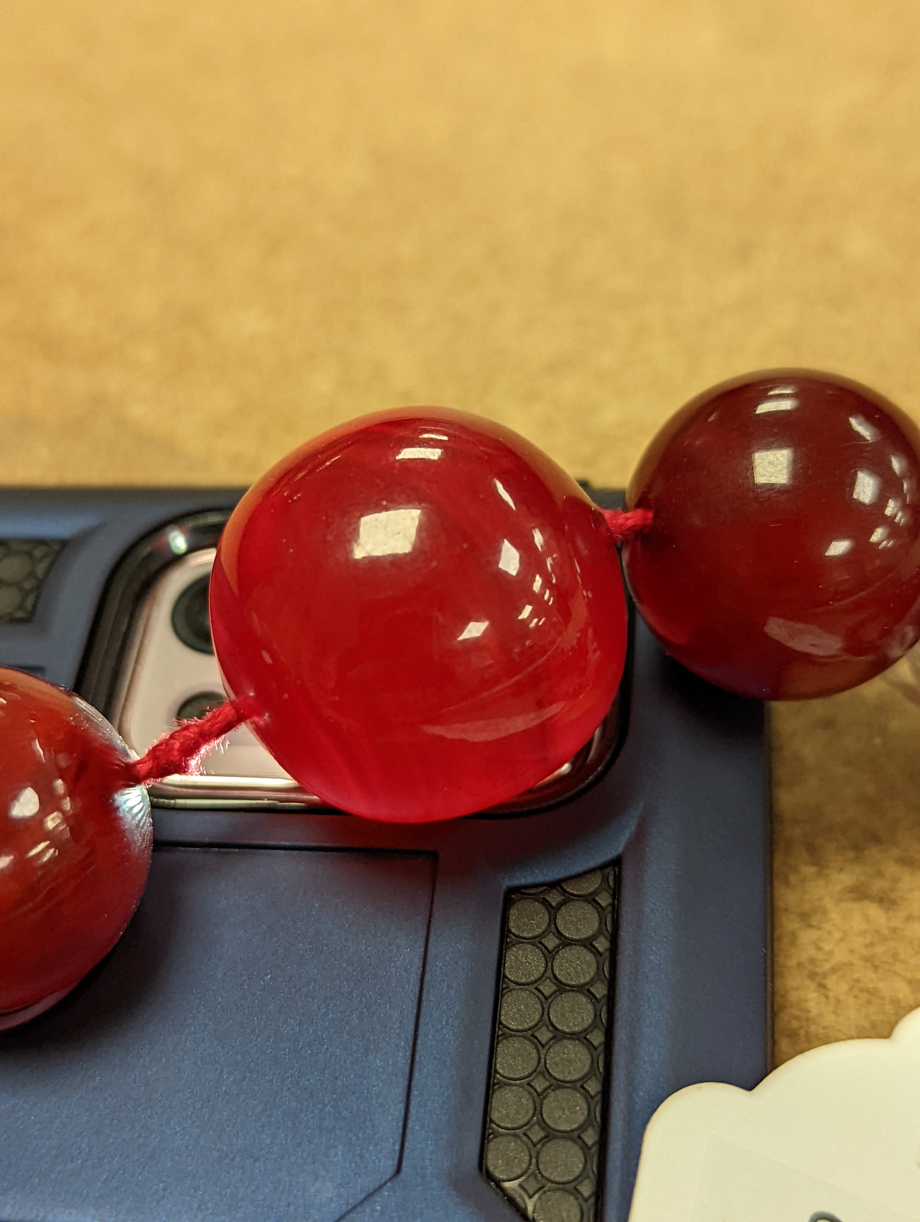 A graduated cherry amber bead necklace, 110cm, gross weight 94 grams.
